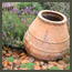 CA Mediterranean garden with antique olive jars, river stones, elfin thyme, Spanish lavender in Los Angeles.